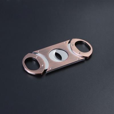 China Custom Stainless Steel Rose Gold Cigar Cutter Sharp Portable Handheld Cigar Cutter From China Manufacturer for sale