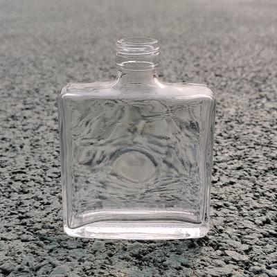 China Luxury Glass Bottles Flint Vodka Container Screw Top High Level Transparency RSG Small Square Super Rectangle Glass Liquor Bottles For Wine for sale