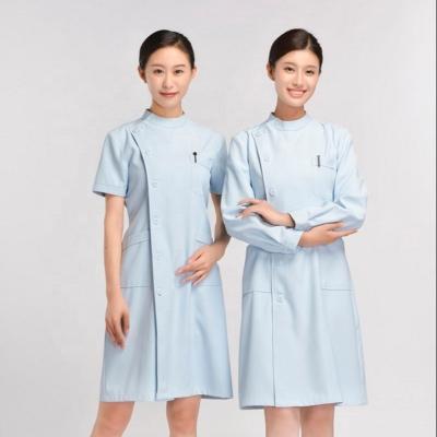 China Custom Made High Quality Comfortable White Blue Pink Elastic Women Hospital Uniforms Pockets Uniform Nursing Scrub Sets for sale