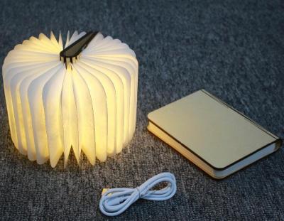 China Portable Super Magnetic Folding Book Lamp Gifts LED Laser LOGO Book Lamp For Birthday Gifts for sale