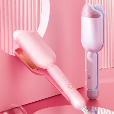 China Negative Ion Hair Care Newest With Lock 3 Barrel Curling Iron Triple Hair Hesitate Best Wand Hair Curler Curling Clips for sale