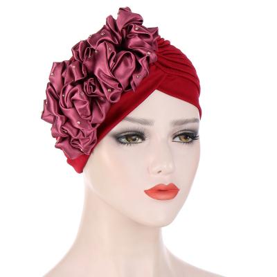 China Popular Image Top Selling Lady Women Muslim Solid Hijab Head Cap Turban Hat Flower For Muslim Women for sale