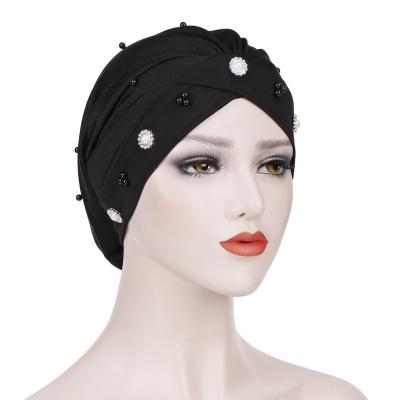 China Custom Picture Logo Women Silk Sleeping Hair Night Hats India Cotton Folds Pearl Muslim Women Turban Hat for sale