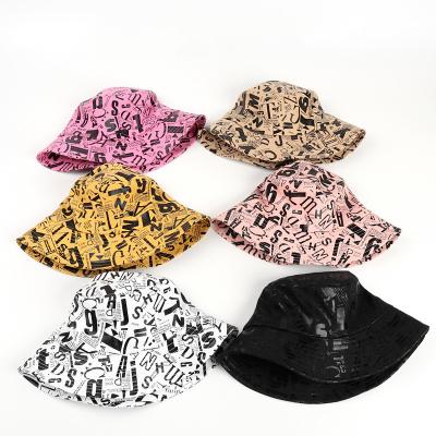 China Fashion High Quality Cheap Wide Logbook Hot Selling Custom Pattern Printed Reversible Fisherman Bucket Hats for sale