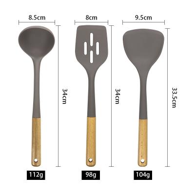 China Silicone Kitchen Three-piece Set Heat Resistant Shovel Non-stick Spoon Wooden Handle for sale