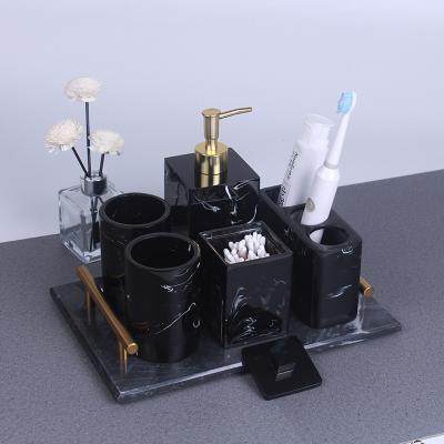 China 6 Pieces Sustainable Bathroom Accessories Black Organization Set With Towel Tray Toothbrush Holder Storage Box Black Lotion Bottle for sale