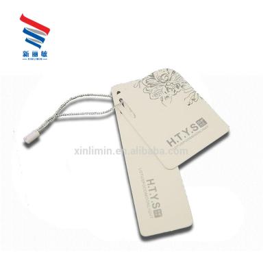 China New Custom High Quality Sustainable Printable Price Paper Swing Hang Tag For Kids Clothes Jeans Fabric for sale