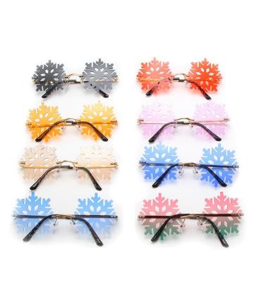 China Fashion sunglasses 2021 new fashion personalized Christmas snow sunglasses men and women stretching party dance rimless sunglasses for sale