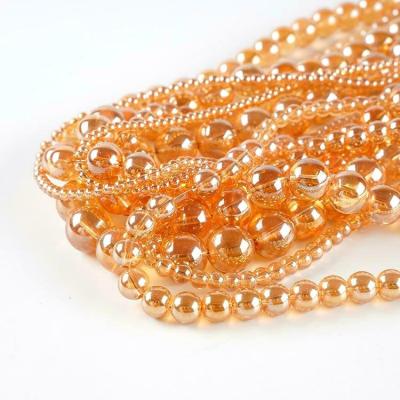 China Glossy Standard Multiple Sizes Glass Beads Decoration Fine Workmanship Around Glass Beads for sale