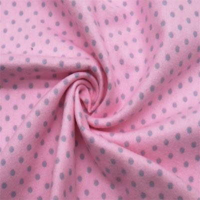 China Comfort 145gsm Pink Wave Dot Printed Cotton Flannel Shrink-Resistant For Dress Fabric for sale