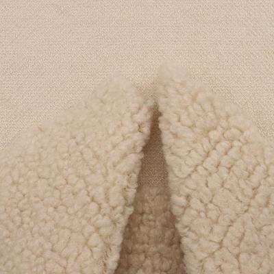 China New fashion 340gsm anti-static solid dyed rice white sherpa knitted polyester material fabric for sale