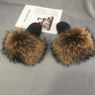 China Anti-odor fashion and luxury wholesale raccoon fur slipper raccoon fur slides for sale