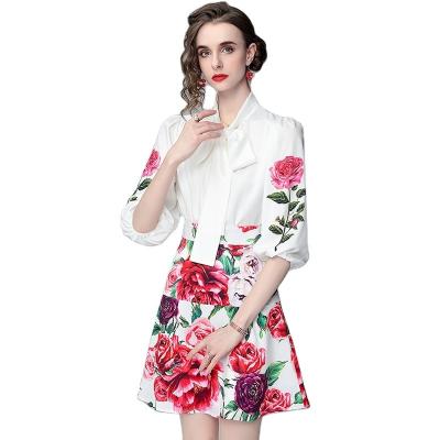 China The other 2022 summer new style peony three quarter print shirt collar sleeve flutter a-line skirt suit WN1127065 for sale