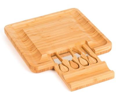 China Sustainable Bamboo Wooden Cheese Board With 4 Drawer Charcuterie Tray Meat And Cheese Stainless Steel Knife Serving Cutlery Set And Sliding for sale