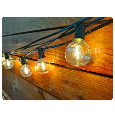 China All holiday Outdoor Indoor Christmas Garland decorative lighting US G40 25FT 50FT 60FT 100FT For Garden Wedding LED String Light for sale