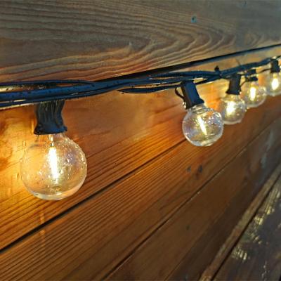 China All holiday 25ft 50ft OEM ODM waterproof flexible vintage warm white E12 socket patio globe led string lights for sale