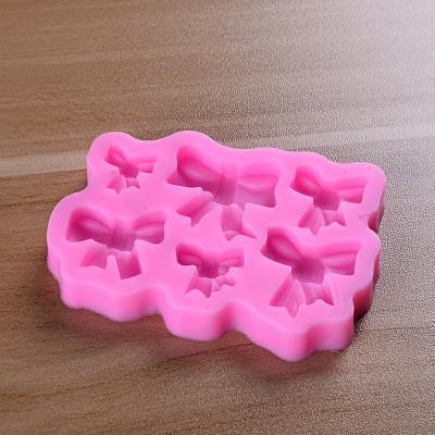 China Viable Bowknot Silicone Mold For Cake Decorating Sugar Gumpaste Clay Craft DIY Resin Molds Christmas Cupcake Topper Molds for sale