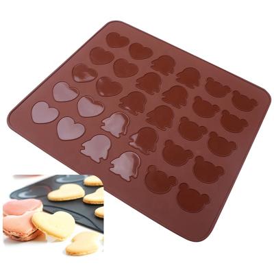 China Viable Silicone Baking Mats 29*26CM Non-Stick Macaron Baking Mats With Heart Bear Penguin Bake Form 30 Holes for sale