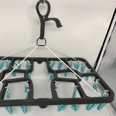 China Multifunctional 24 Pegs Clip Folding Hook Hanger Drying Rack Laundry Folding Clothespins for sale