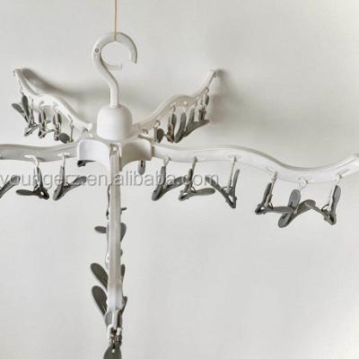 China Custom Plastic Hanger Folding With Pegs Hanger With Clips for sale