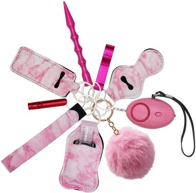 China TaiLai Eco-Friendly Material Key Chain Set For Women Girls Safety Kit Safety Alarm Pom Pom Wrist Key Ring Self Defend Metal Key Chain for sale