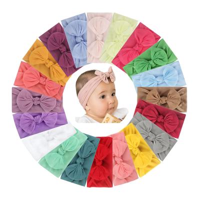 China Exquisite Soft Unique Comfortable Stretchy for Kids to Use Tailai Handmade Baby Headband with Bows Stretchy Nylon Headbands for Infant Babies Hair Accessories for sale