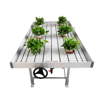 China Growing Greenhouse Seedling Price Per Meter Greenhouse Bench Systems Easy Flow Hydroponic Table for sale