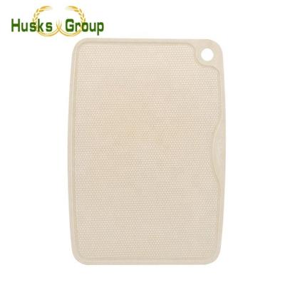 China Sustainable Cutting Rice Husk Fiber Cutting Board Vegetable Natural Kitchen for sale