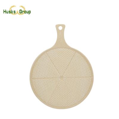 China Sustainable Premium Rice Strips Fiber Around Pizza Peel Cutting Board Serving Tray for sale