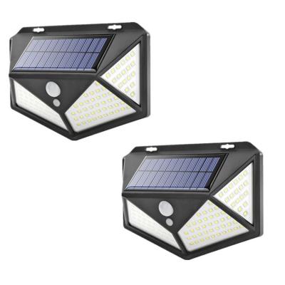 China Garden New Solar Rechargeable 100LED Wall Lamp With Four Sides Human Body Induction Lamp Glowing Outdoor Lighting Modern Yard for sale