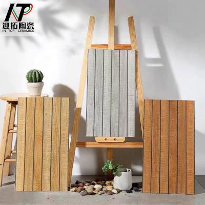 China Metallic Tiles 30x60cm Glazed Wooden Floor Tiles And Wall Look Timber Tile for sale