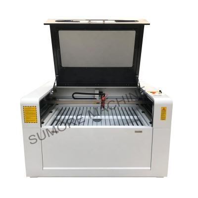 China Laser CUTTING SUMORE 1390 high quality cnc CO2 laser cutting engraving machine with table size 1300x900mm SP1390B for sale