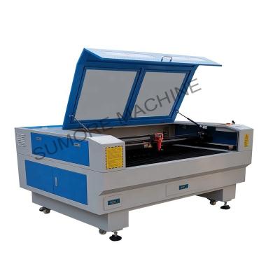 China Laser CUTTING CNC CO2 laser cutting engraving machine with table size 1300x900mm SP1390N for sale