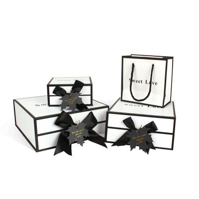 China Recycled Materials Zhuoyida Classic Simple Handmade Magnet Gift Boxes With Ribbons For Christmas Gifts for sale