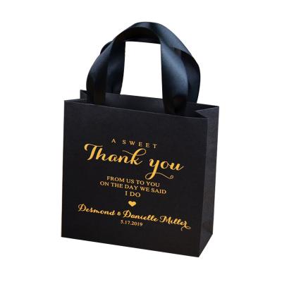 China Recycled Materials Zhuoyida Custom Printed Cardboard Paper White Gift Bag With Ribbon Wedding Gift Bag for sale