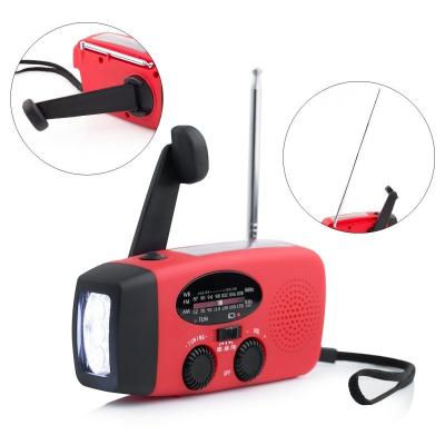 China Multifunctional Radio Portable Emergency Hand Crank FM Solar Radio With Flashlight Charger for sale