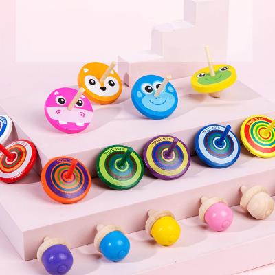 China 2022 Wooden Top Toy Funny Gyro Colorful Spinning Hosale Random Color Material Eco-friendly Top Toy Burst Classic Toy For Kids for sale