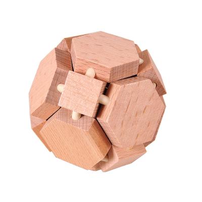 China Toy Classic Football Shaped Beech 3D Wooden Burr Puzzles Educational Wooden Educational Game Toys IQ For Adults Children for sale