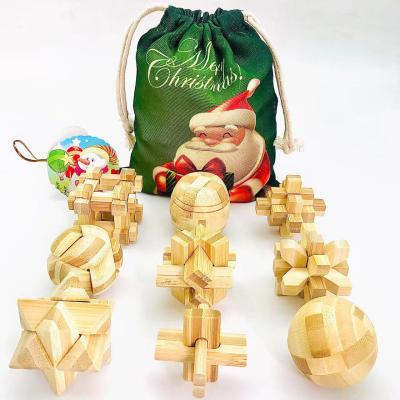 China Educational Interlock Mind Brain Teaser Educational Puzzles Game Jigsaw Puzzle Toy Christmas Gift 9PCS/Set Mini Size Bamboo Wooden Burr for sale