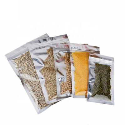 China Food Clear Front Silver Back Stand Up Smell Proof Resealable Foil Packaging Food Storage Doypack Ziplock Pouches Clear Mylar Bags for sale