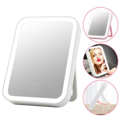 China Hot Selling Lighted On Amazon Touch Screen Make Up LED Mirror Cosmetic Folding Portable Pocket LED Lighted Makeup Mirror for sale