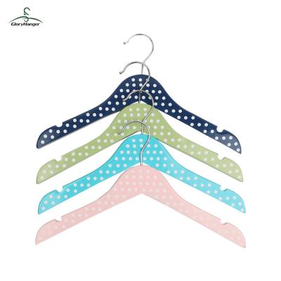 China Non-slip Promotional Bulk Novelty Wooden Baby Clothes Hanger With Dots for sale