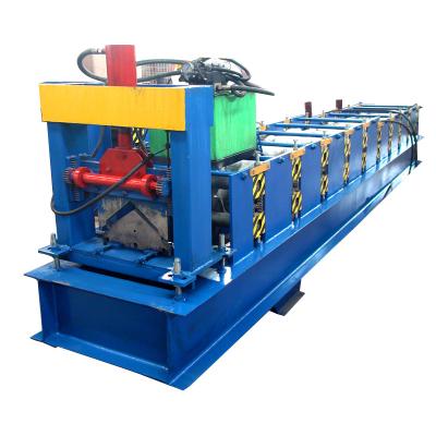 China Building material shops GI house color ppgi roof ridge tile steel sheet making machine ridge tile roll forming machine for sale