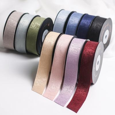 China Decorative High Tenacity Polyester Wholesale Ribbon For Gift Package Hair Accessories Clothing Accessories Double Sided Suede Webbing for sale