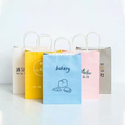 China Y27 Recycled Materials Recycled Small Brown Packaging Kraft Paper Bags With Handles Cheap Customized Printing Craft Paper Bag for sale