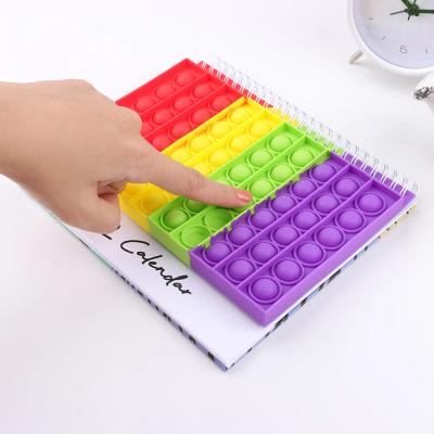 China Kids Toy Educational Top Design Fashionable Push Noise Popit Stir Toy Decompression Toys Silicone Rainbow Restless Person Desk Calendar for sale