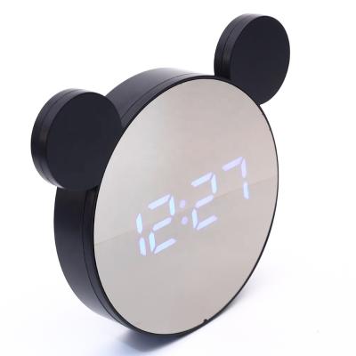 China Mirror Desk Home Sleepy Alarm Clock Calendars Bedroom LED Induction Photoelectron Digital Creative Clock for sale