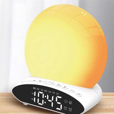 China Modern Wake Up Alarm FM Radio Projection Clock 7 Colors Night Light Sunrise Light Simulation Double Drowsy Time And Nap for sale