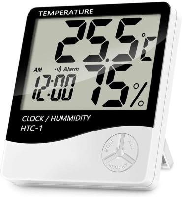 China Indoor HTC-1 Room LCD Temperature Humidity Meter Digital Thermometer Hygrometer Electronic Alarm Clock 102*93*22mm for sale