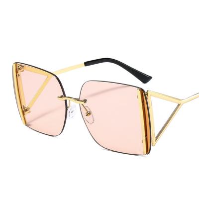 China Hot Selling Luxury Metal Frame New Design Sunglasses Fashion Stylish Trendy Rimless Sunglasses Shading Unisex for sale